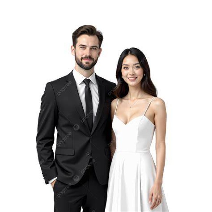 a man and woman posing on the red carpet at an awards event stock image