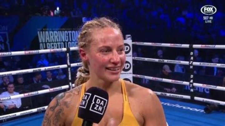 Boxing news Ebanie Bridges flashes breasts in middle of interview