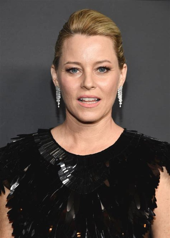 Elizabeth Banks looks the picture of happiness as she takes a leisurely