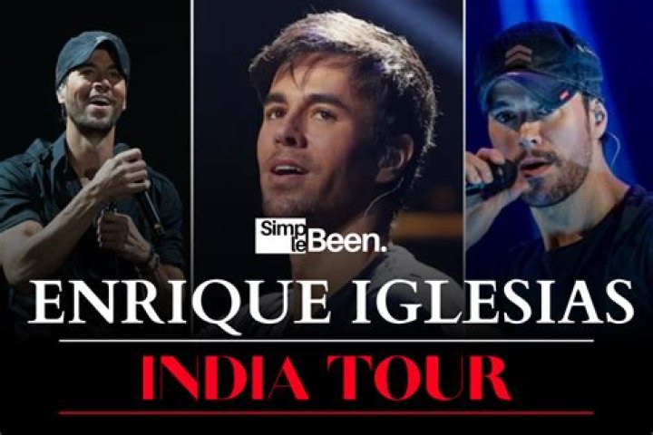 Enrique Iglesias performs in a navy blue shirt and a cap