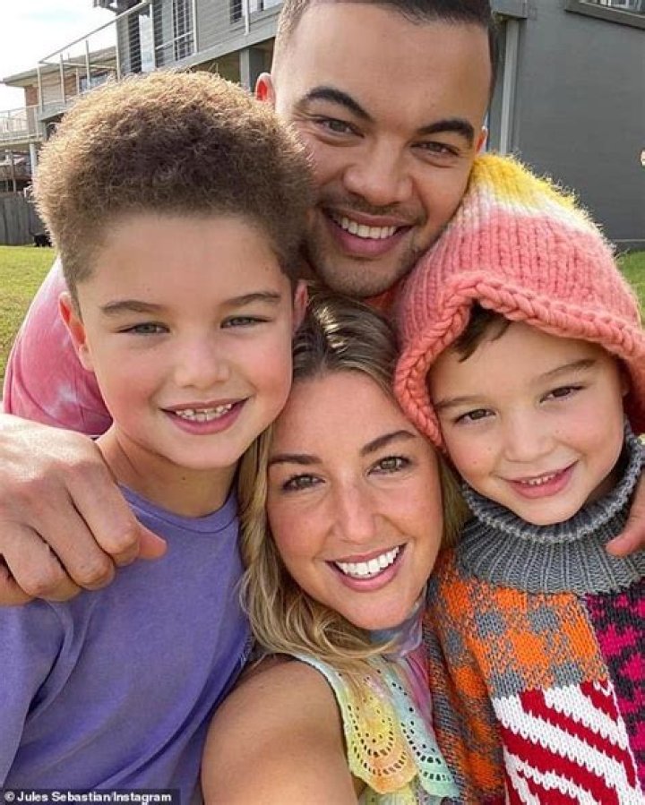 Guy Sebastian beams alongside his wife Jules and his lookalike sons