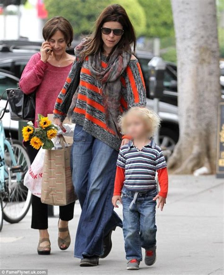 Neve Campbell dotes on her cute son Caspian as at the Farmers Market