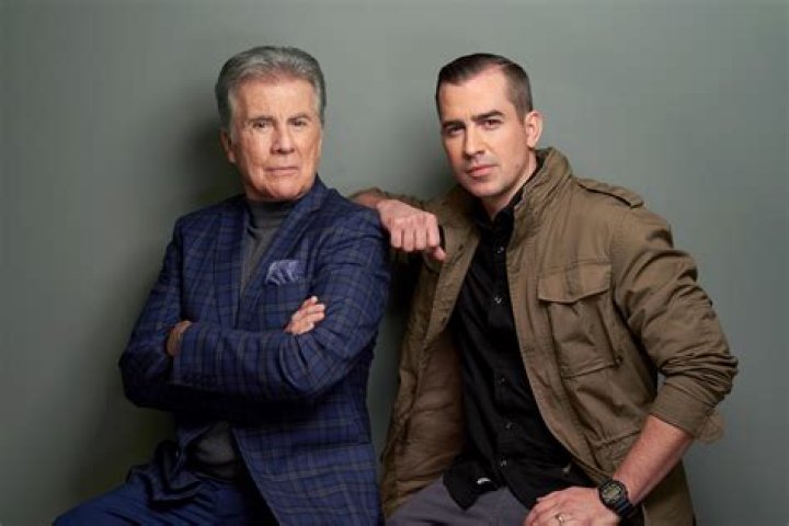 Photo John Walsh (L) and wife Reve Drew arrive at the Primetime