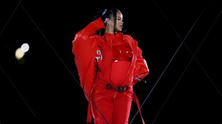 Rihanna is PREGNANT! Singer shows off bare baby bump in freezing NYC