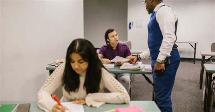Teacher Caught His Student Cheating During an Exam &middot; Free Stock Photo