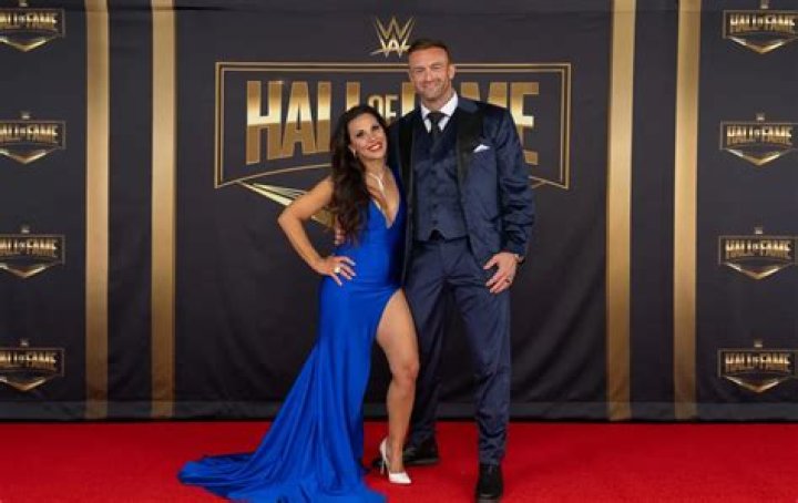 WWE Superstar Mickie James and her fiance Nick Aldis with their